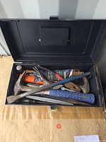 Toolbox interior showing assortment of tools