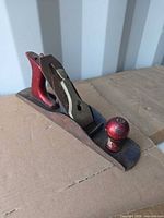 Right side view of Stanley No. 5 plane showing red tote, knob and body