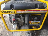 Left front view showing Wacker branding, GP 2500 control panel and outlets