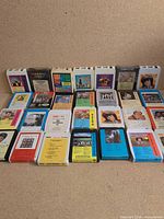 Overall view of collection laid out in rows showing quantity and mixed shell colors