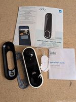 Arlo doorbell, mounting bracket, faceplate, wiring harness, manuals