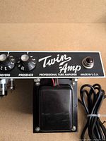 Front control panel showing Twin Amp branding and knobs