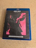 Front cover of John Wick Chapters 1-4 Blu-ray case