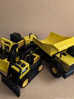 Three Tonka vehicles grouped together