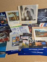 Group of stacked calendars showing covers, titles and years