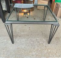 Full view of square glass-top metal side table