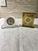 Front view of both clocks together