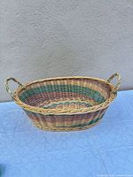 full view of oval multicolor wicker basket
