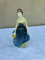 Front view of figurine showing overall design and colors