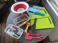 Group shot of all camp kitchen items on round table