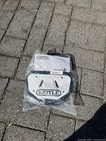 Sealed Battle back plate front view on pavement