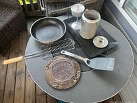 Overview of all cookware pieces on table