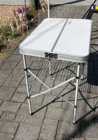 Camping kitchen folded as compact table