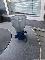 Coffeemaker assembled showing funnel and clamp base