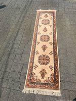 Full view of wool hall runner showing pattern and fringe