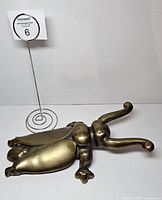 Top view of brass beetle boot jack showing full form