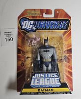 Front of blister-carded Batman figure with pig accessory