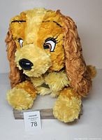 Front view of plush dog showing face and texture