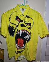Front view of yellow shirt with King Kong graphic