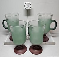 Front view of all four Libbey frosted glasses on white background