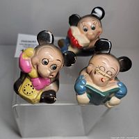 Front angled view of the three Mickey Mouse pencil sharpeners