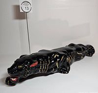 full side view of black panther figurine