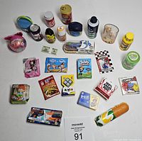 Full overhead view showing all miniature items laid out for count and identification