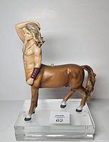 Full side view of centaur on acrylic riser