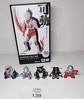 Front view of boxed S.H. Figuarts Ultraman plus five SD figures lined up