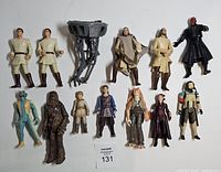 Full group shot showing all figures and accessory