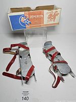 Pair of skates with box displayed