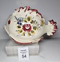 Left side view showing floral design and shape
