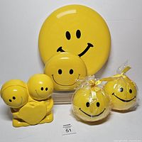 front view of all five smiley decor pieces together
