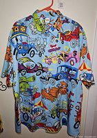 Full view of front of shirt on hanger