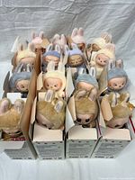 Full lot of 15 boxed plush bunny bag charms