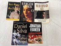 Group shot of all five paperback books