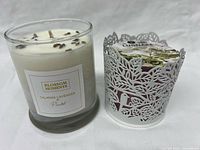 Both candles side by side showing condition and design