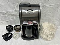 Coffee maker front view with all components laid out