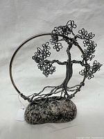 Front view showing entire wire tree, circular frame and granite base