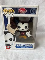 Front of boxed Funko Pop Mickey Mouse showing figure and damage to window