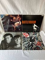 Group shot of all four LP covers