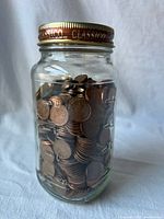 Full view of Classico glass jar filled with Canadian pennies