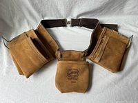 Front view showing all pouches, hammer loops and buckle