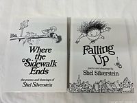 Front covers of both books