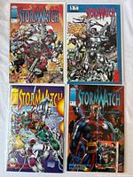 Group shot of four bagged and boarded Stormwatch comics (#0, #1, #3, Sourcebook #1)