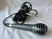 Full microphone with attached cable and 1/4-inch plug