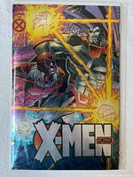 Front view of bagged X-Men Omega comic showing full metallic cover artwork