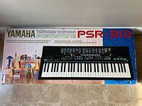 Retail box top showing model and keyboard image