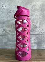 Full view of Lifefactory pink glass water bottle front