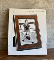 Front of retail box showing picture frame design